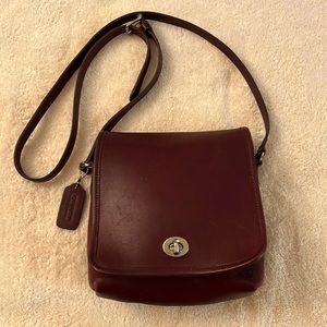 Coach burgundy crossbody leather bag